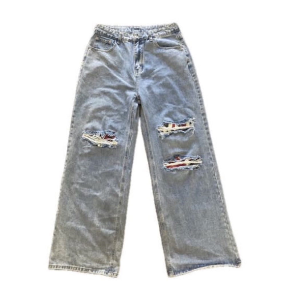 Big baggy ripped jeans with British flag in rips unisex